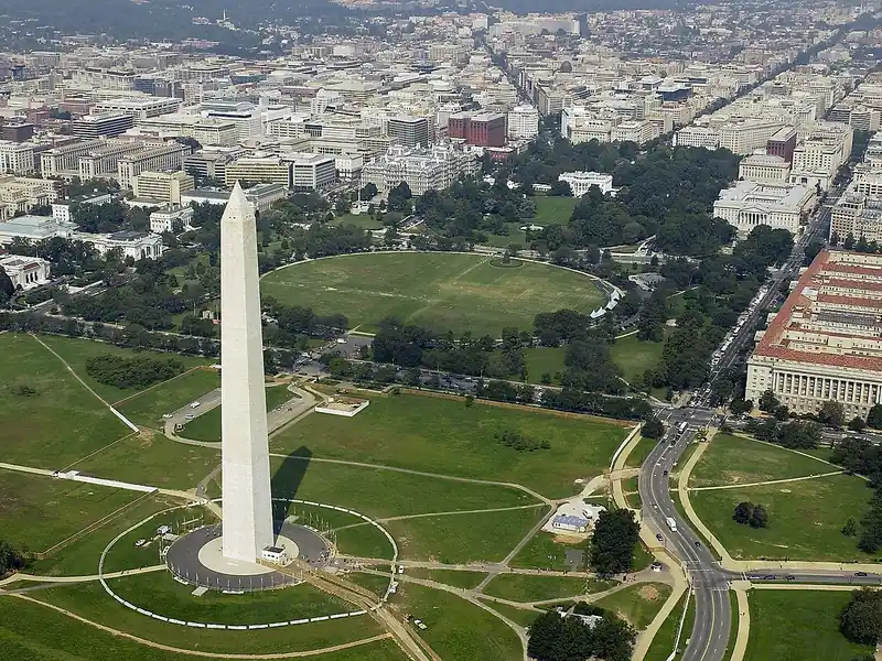 Aerial view of the Washington Monument on the green National Mall